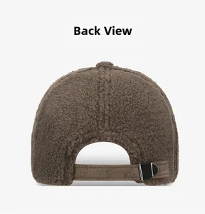 Detail view of the plush brown teddy fleece baseball cap with metal buckle back closure