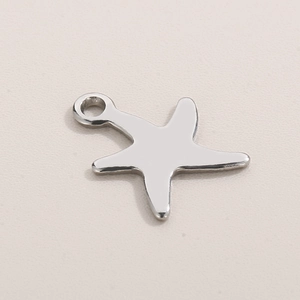 Polished silver starfish metal pendant with a smooth finish for jewelry making