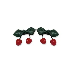Detail showing cherry duckbill hair clip dimensions and high-quality resin materials