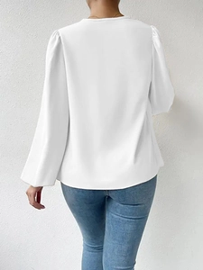 Back view of women's white long sleeve chiffon blouse featuring elegant lantern sleeves