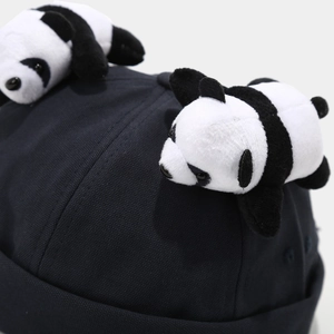 Creative black canvas brimless dockers hat with two mini panda plush decorations on top
