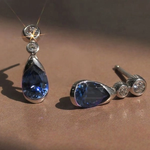 Pendientes de lujo vintage en forma de pera con piedra azul oscuro y plata