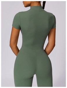Rear view of dark green short sleeve yoga bodysuit with sleek high-stretch fabric fit