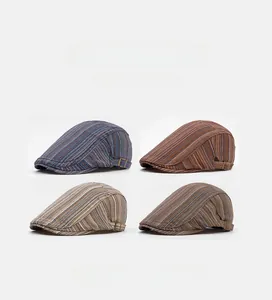 Detail view of retro striped ivy caps with metal buckles in four color patterns