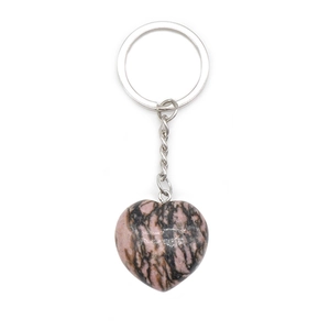 Pink heart-shaped natural crystal stone keychain with silver metal ring on white background