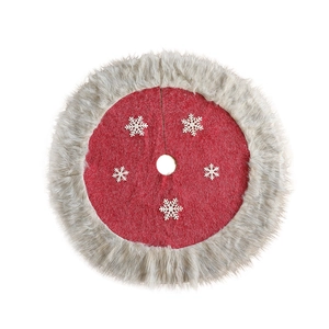 Red Christmas tree skirt with white snowflake patterns and grey plush faux fur border