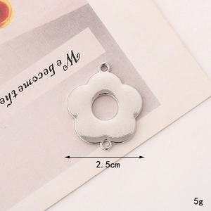 Macro view of a 2.5cm silver flower-shaped zinc alloy connector for jewelry making