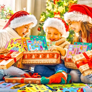 Kids happily opening Easter bunny puzzle sticker gift sets in a cozy indoor holiday setting