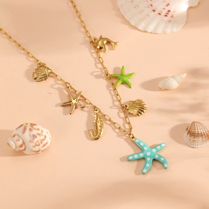Golden titanium steel ocean theme necklace with starfish shell and fish pendants