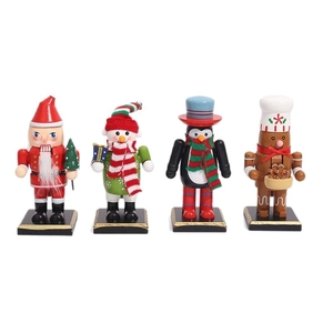 Set of 4 Christmas nutcracker figurines including Santa, Snowman, Penguin and Gingerbread Man