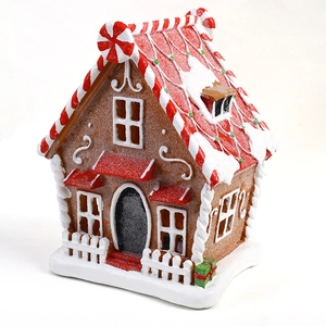 Maison en pain d'épices lumineuse en résine avec texture de sucre et toit candy