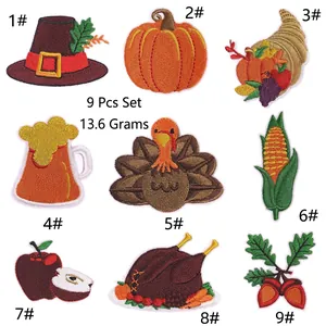 Macro detail of 9-piece Thanksgiving embroidery patch set including pumpkin and turkey