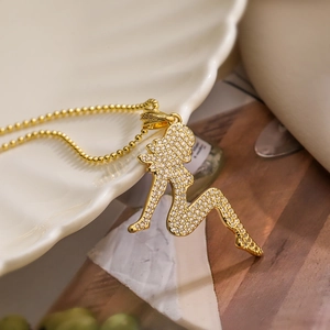 18K gold plated necklace featuring a stylish zircon-encrusted female silhouette pendant