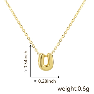 Detail view of the gold U-shaped letter pendant showing 0.34 inch height and 0.28 inch width
