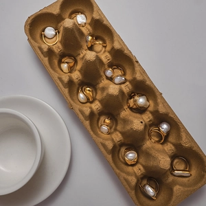 Baroque pearl rings set in gold-plated stainless steel displayed in creative packaging
