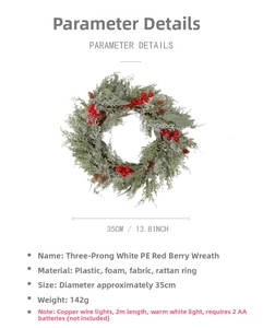 Detail of snowy PE red berry wreath with warm LED copper wire lights and pine cones