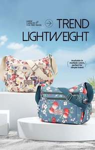 Detail view of large capacity crossbody bag with butterfly prints and multi-pocket design