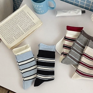 Set of five striped cotton mid-calf socks in assorted colors with a ribbed cuff design