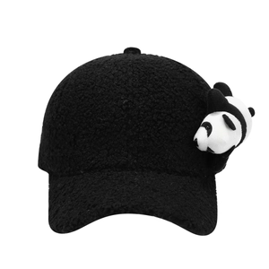 Detail of black faux shearling baseball cap with cute 3D plush panda doll decoration