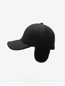 Detail view of winter baseball cap for elderly men with ear flaps and embossed SPORTS text