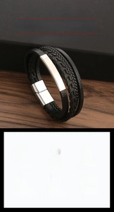 Detail view of multi-layer black leather bracelet with stainless steel magnetic buckle