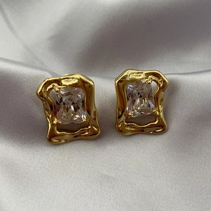 Vintage rectangular gold earrings with hammered texture and clear crystal zircons
