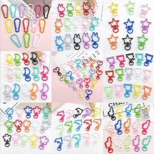 Assorted colorful candy paint lobster clasps in star, heart and flower shapes for DIY jewelry