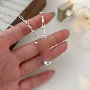 S925 silver bow heart zircon OT clasp necklace with asymmetric chain design for women