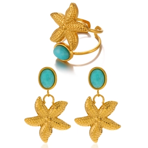 Golden starfish jewelry set with blue gemstones including open ring and drop earrings