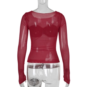 Detail of red sheer mesh long sleeve top showing transparent fabric and slim fit design