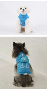 Detail view of lake blue dog vest with 3D bear pocket and snap button closure