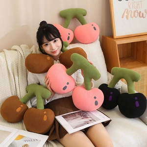 Plush cherry throw pillows in pink, brown and black colors for home decor and napping