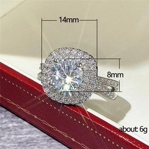 Luxurious halo engagement ring with round center diamond and pavé double twist band