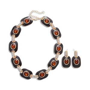 Parure de bijoux vintage dorée et noire avec pierres ambrées et strass brillants