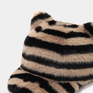 Detailed close-up of plush tiger print baseball cap featuring cute decorative cat ears