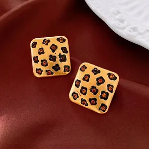 Boucles d'oreilles vintage carrées motif léopard dorées avec cristaux orange