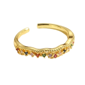 Adjustable wavy gold ring with colorful cubic zirconia stones in a prong setting