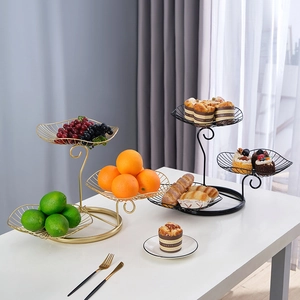 Nordic 3-tier iron fruit basket in gold and black with spiral wire leaf design