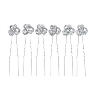 Set de 6 horquillas de metal plateado con nudos florales de diamantes sobre fondo blanco