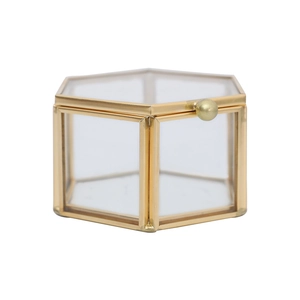 Hexagonal brass and glass jewelry box with a gold metal frame and clear panels