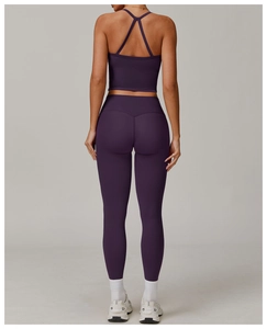 Rear view of deep purple high-waisted yoga leggings and Y-back sports bra set