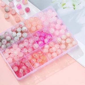 Pink assorted glass beads DIY kit in a clear organizer box for jewelry making