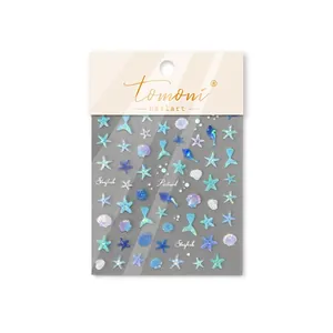 Autocollants ongles sirène holographiques dégradé bleu avec motifs étoiles et coquillages