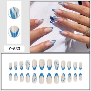 Blue and white almond press-on nails set with French tip and wave patterns