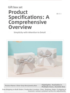 Macro view of white rigid jewelry gift boxes with elegant silver-grey satin bows
