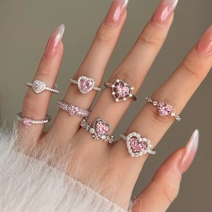 Elegant S925 silver rings with pink heart zircons worn on hand for women