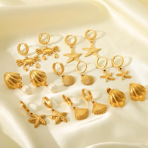 Collection of 18K gold-plated stainless steel ocean earrings with crab and shell charms