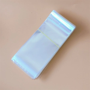 Close-up of bundled transparent OPP plastic bags with hanging holes for jewelry packaging