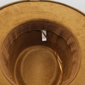 Detailed interior of suede fedora showing sweatband, sizing cord, and polyester label