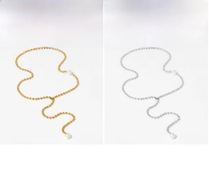 Detail of Y-shaped tassel necklaces in gold and silver finish with pearl accents